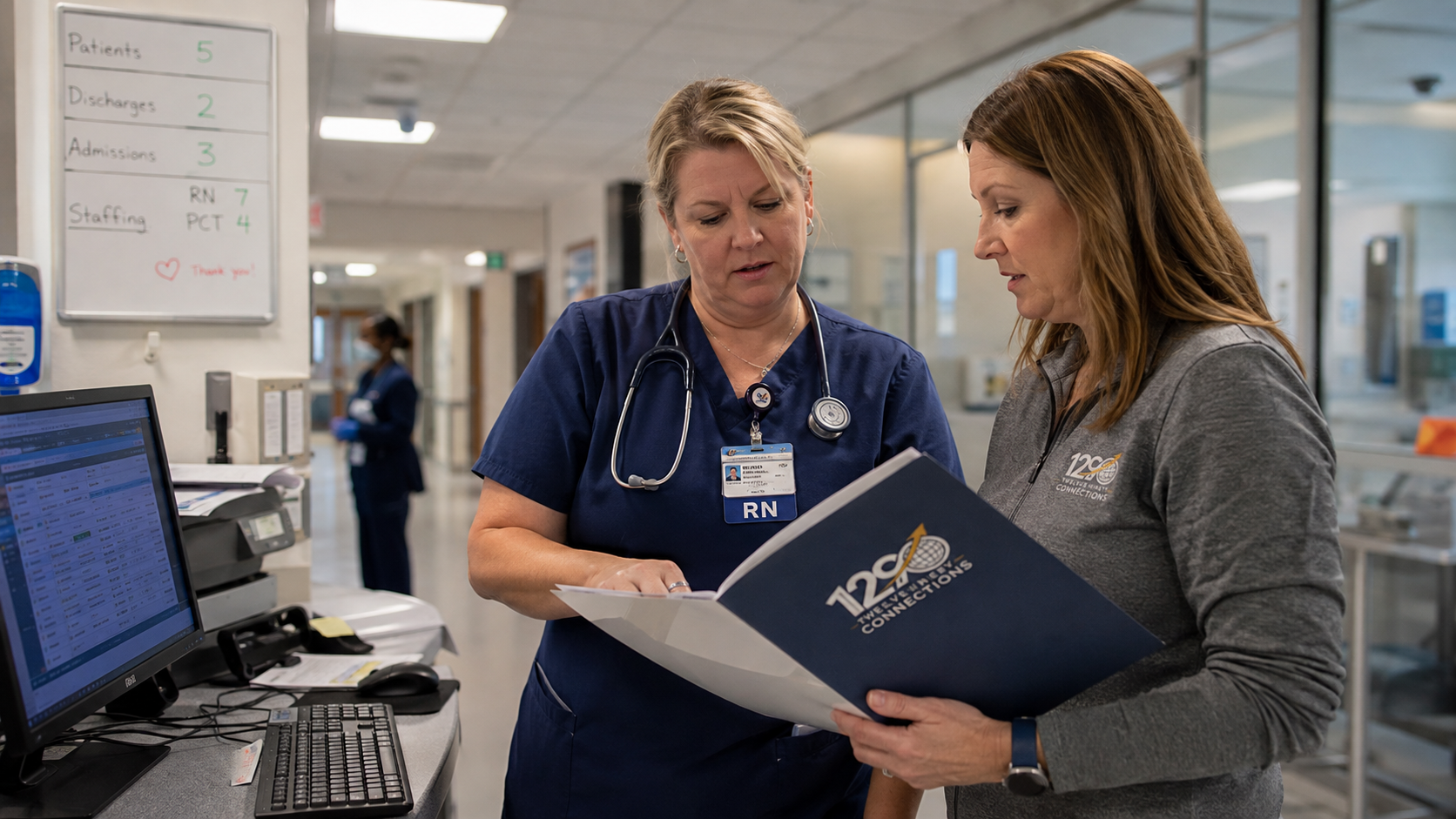 A nurse and healthcare operations professional review patient and staffing information together in a hospital.